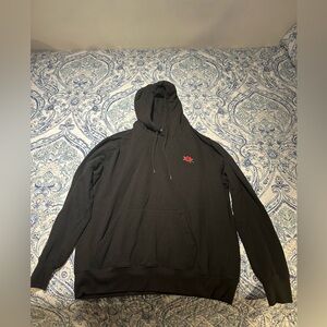 Black sweater red rose design